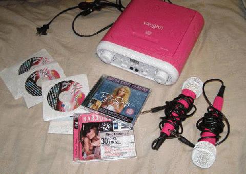 Vaughn pink Karaoke machine con 8 CD de música