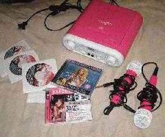 Vaughn pink Karaoke machine con 8 CD de música