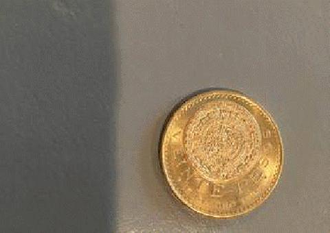 Moneda de oro.  moneda de oro de 20 pesos año 1959 (calendario azteca)