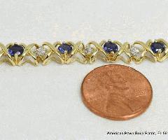 Tanzanita redonda del oro amarillo 14K con la pulsera del acoplamiento del acento XO del diamante