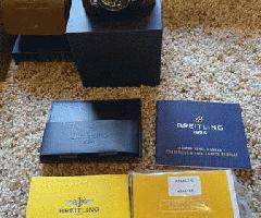 Auténtico Breitling Unitime con pulsera de acero w / caja y papeles