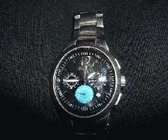  puma negro hizo frente a la pulsera del metal del color de plata del reloj